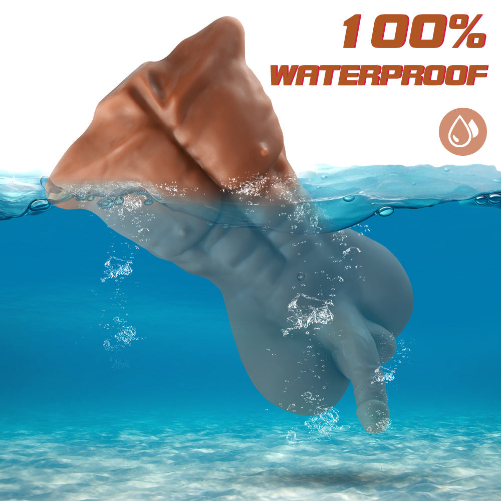 Male sex doll torso submerged underwater highlighting 100% waterproof feature with text '100% WATERPROOF' and a water droplet icon.
