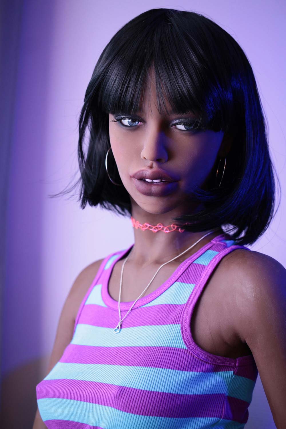 Close-up of Karida sex doll with black hair and jewelry