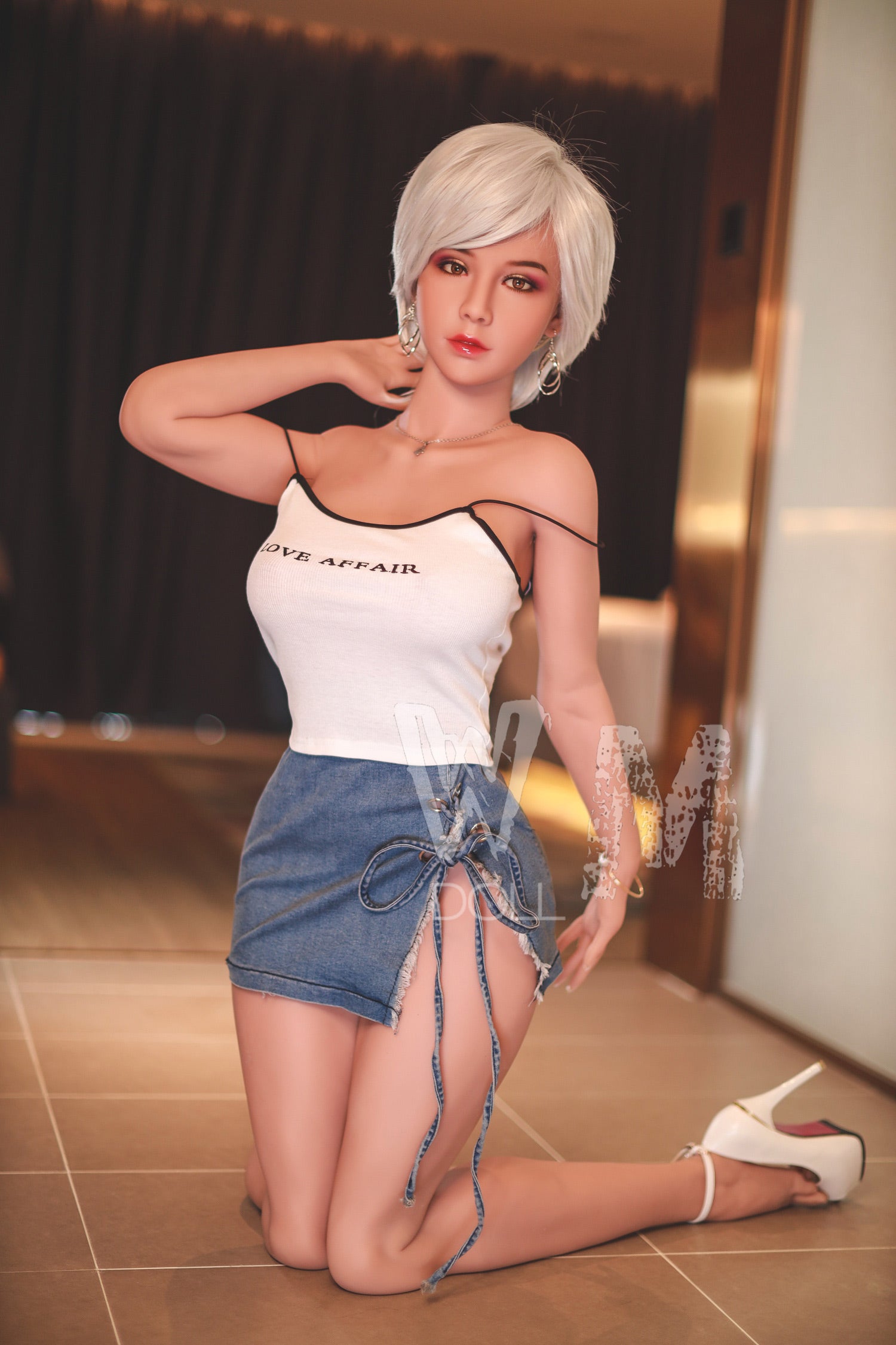 Yvette sex doll wearing "LOVE AFFAIR" top and denim skirt