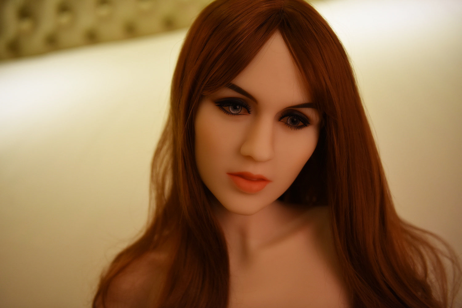 Angie TPE sex doll, close-up portrait with auburn hair