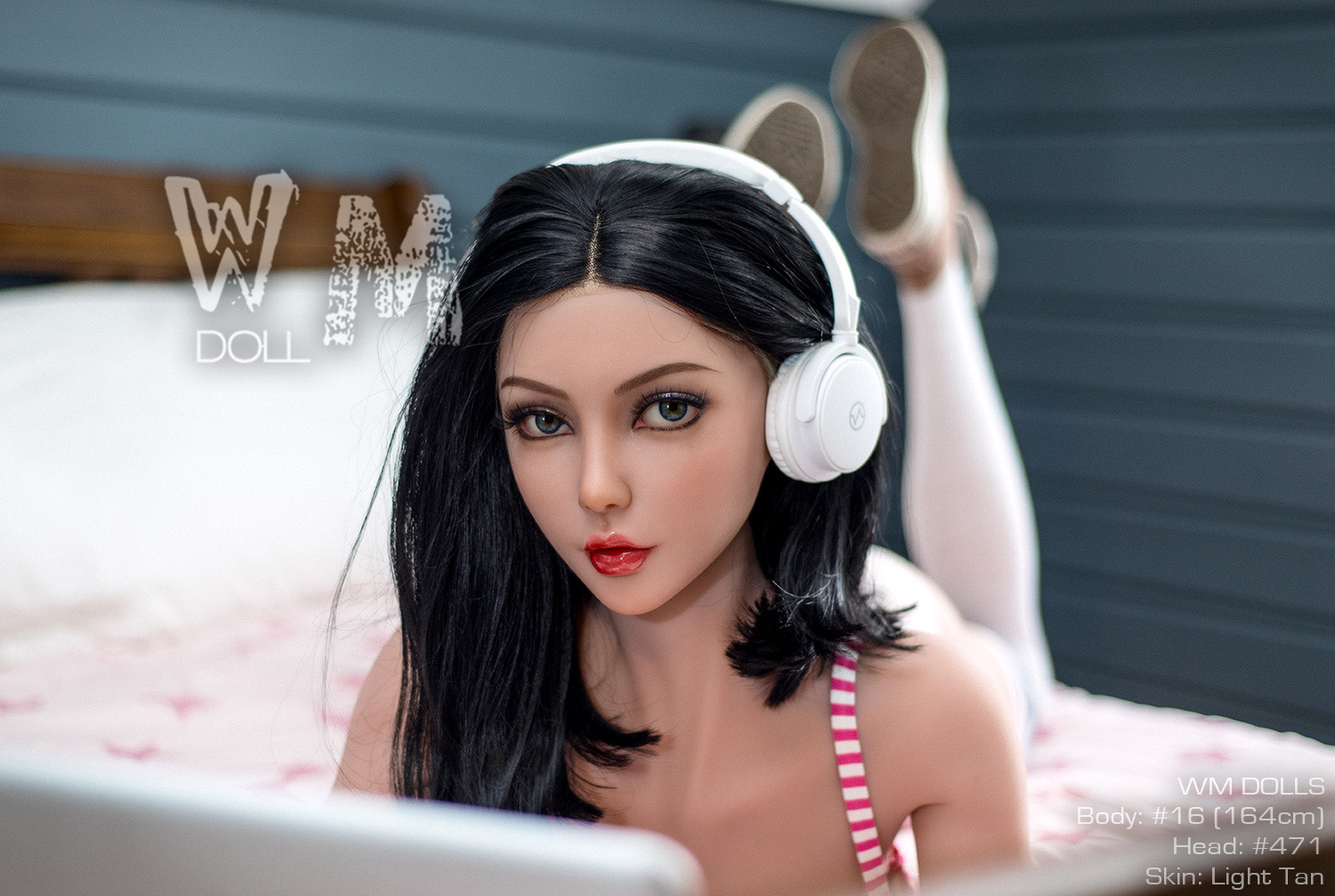 WM DOLLS 164cm sex doll with white headphones, light tan skin