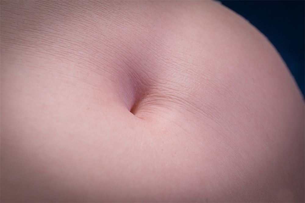 Close-up of Lexi sex doll torso's belly button