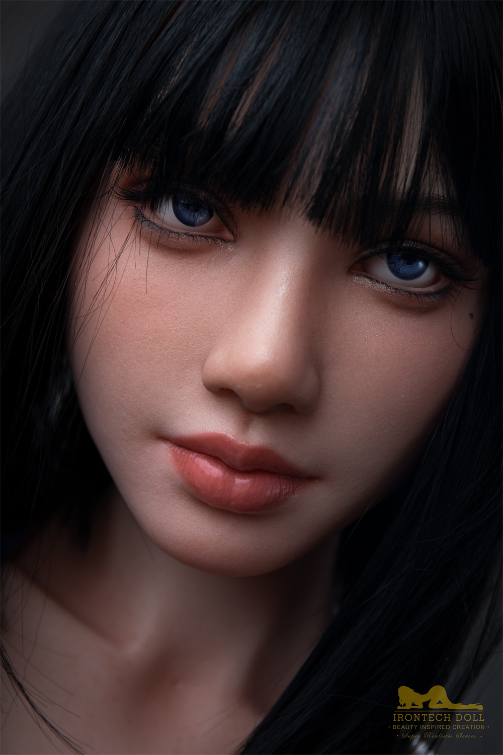 Irontech Rita doll face close-up with blue eyes