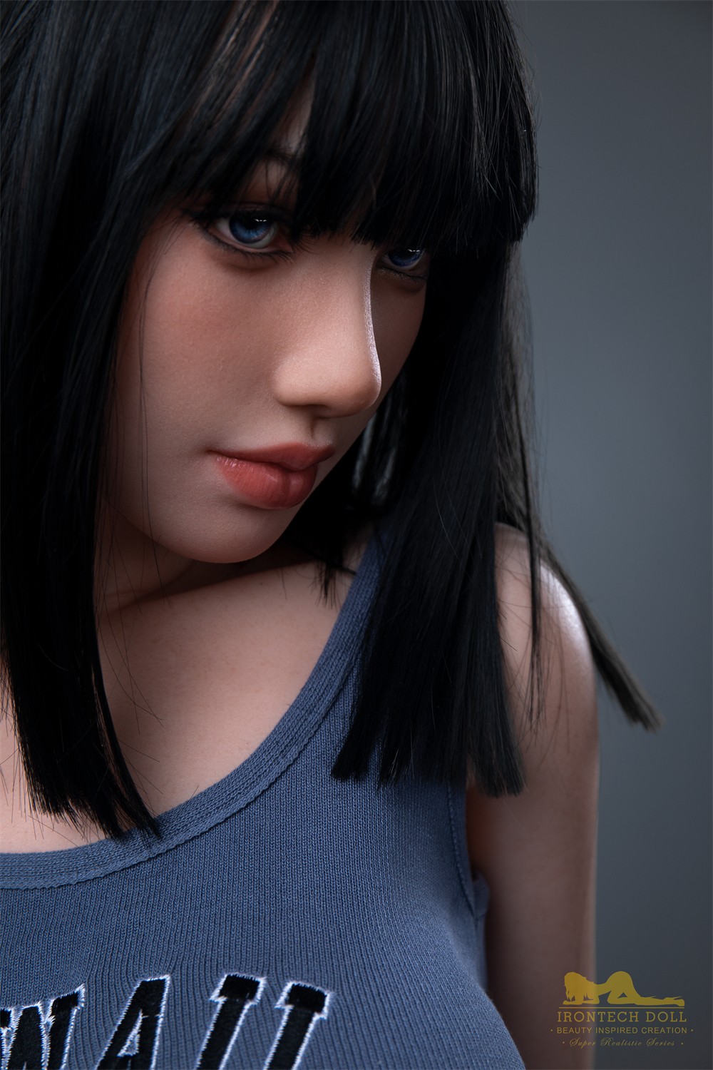 Close-up of Rita sex doll face, blue eyes, and Hawaii tank top