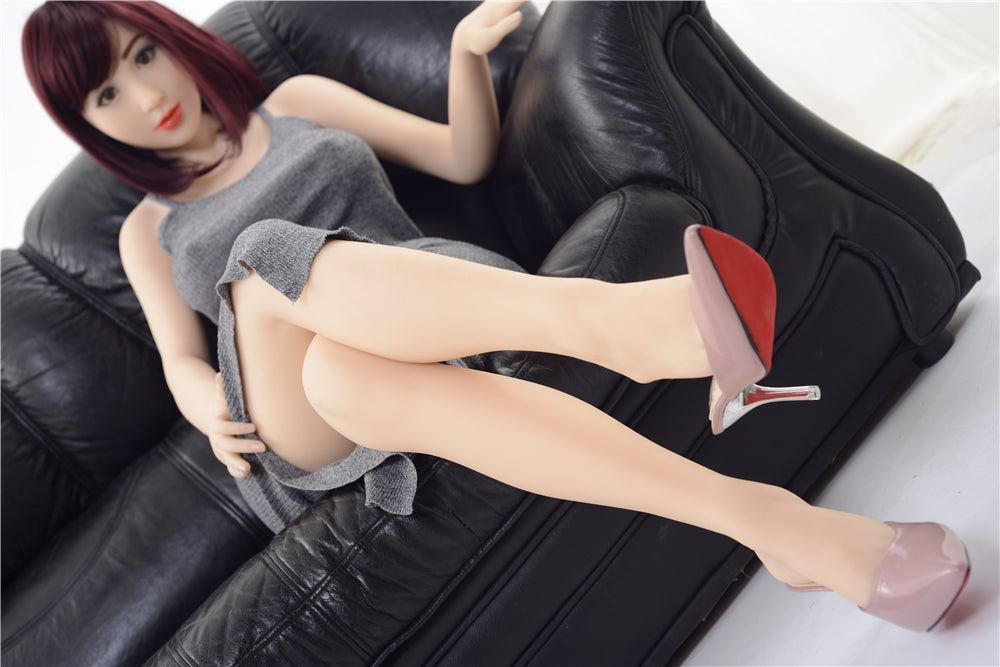 Realistic TPE sex doll Jennifer, wearing gray dress and high heels