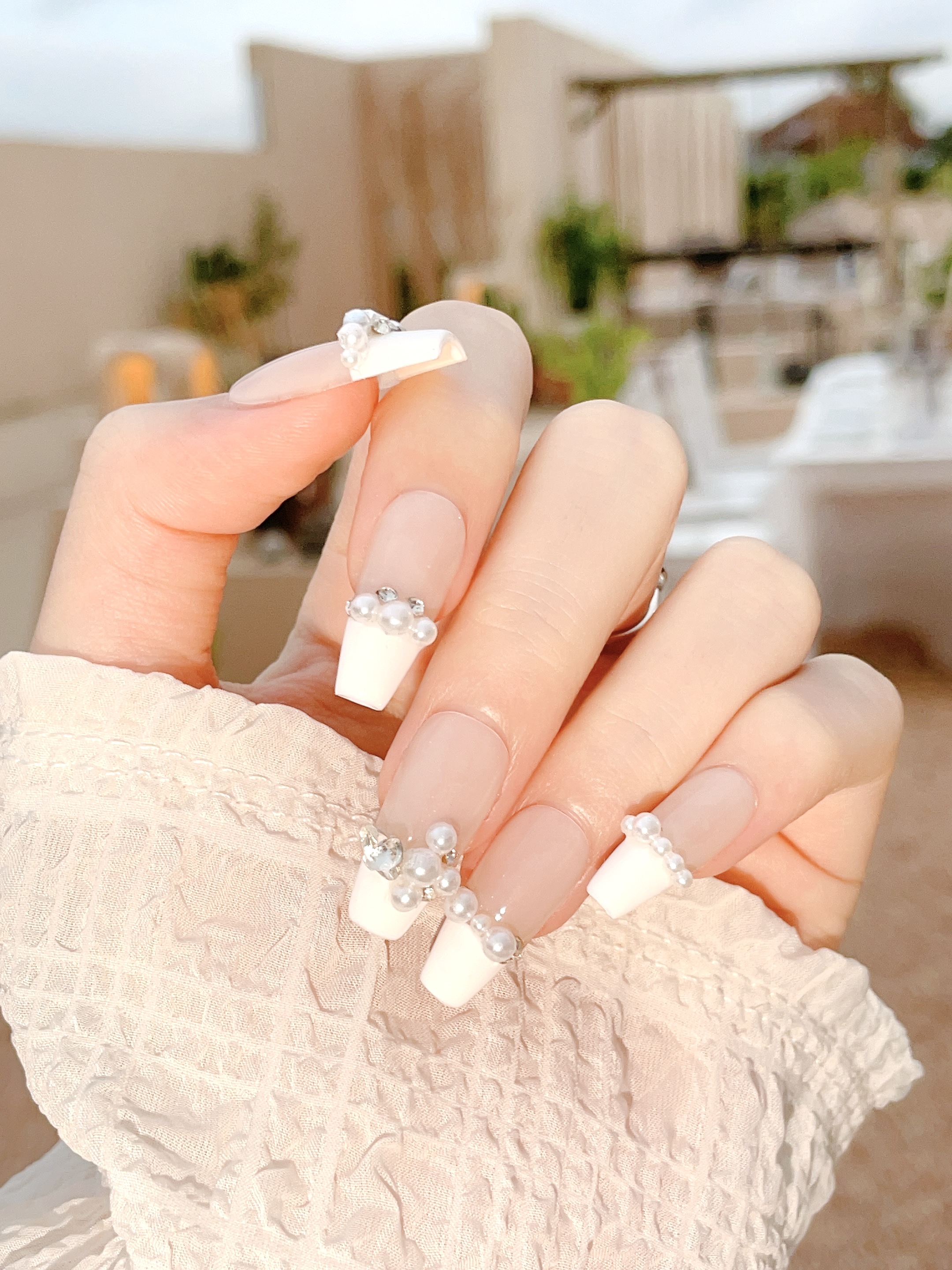 The Hottest 2022 Wedding Trend: Pearls - Belle The Magazine | Pearl nail  art, Pearl nails, Wedding nails