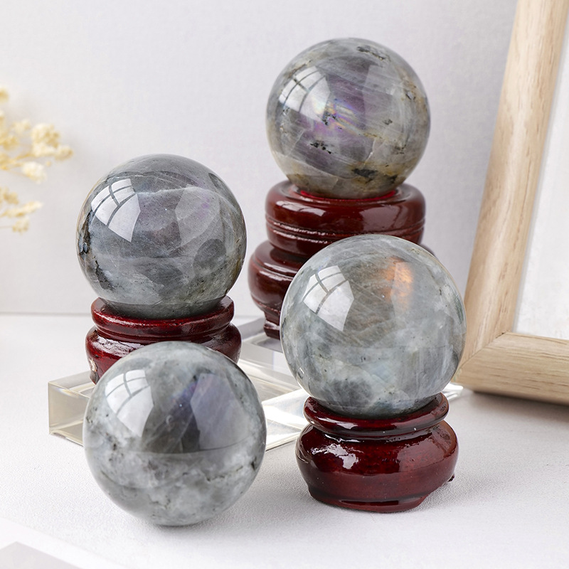Natural crystal purple light elongated stone ball