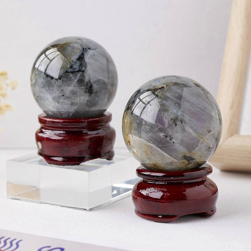 Natural crystal purple light elongated stone ball
