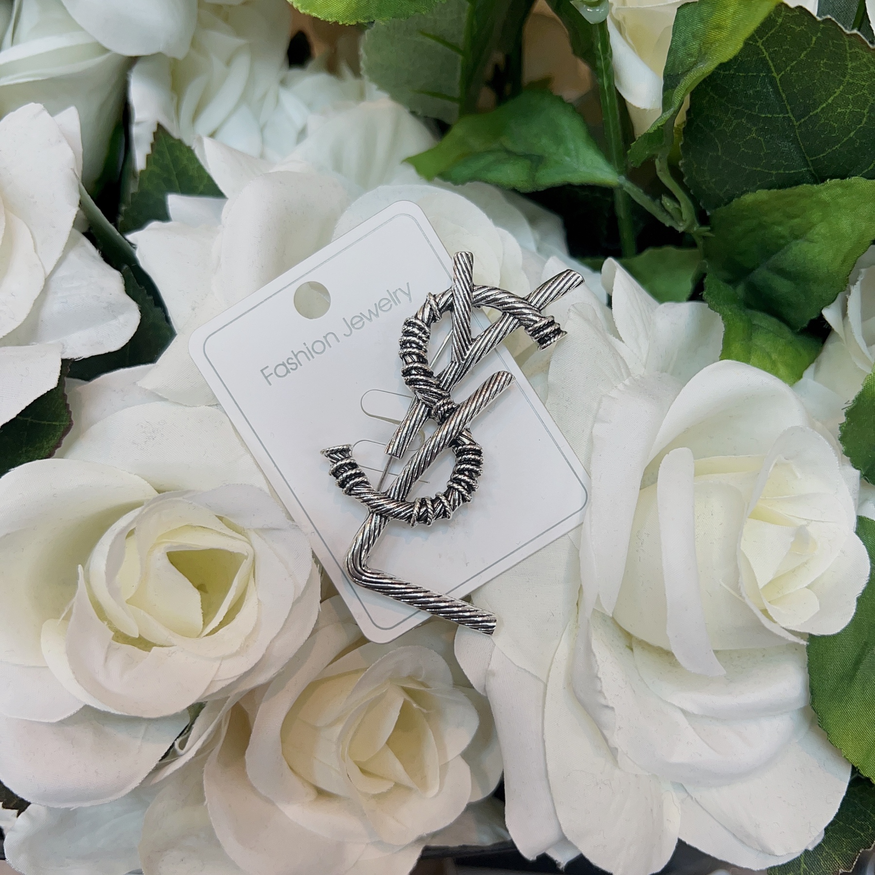 P11. PIN YSL SILVER