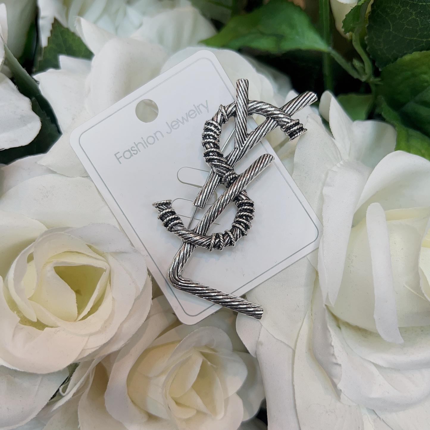 P11. PIN YSL SILVER