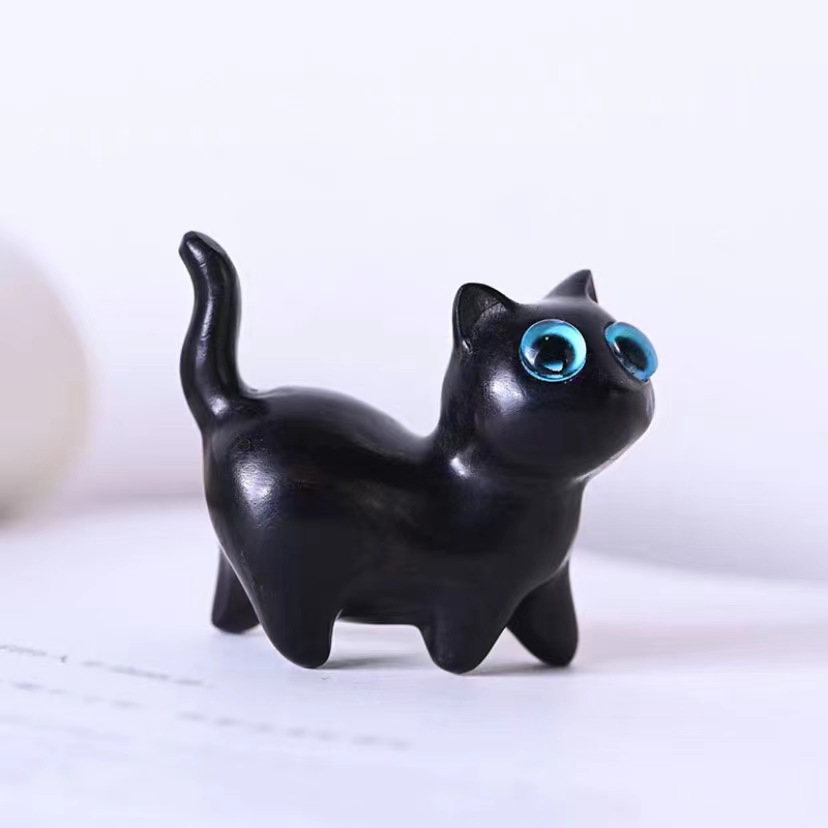 chinese black sandalwood wood carving blue eye cat