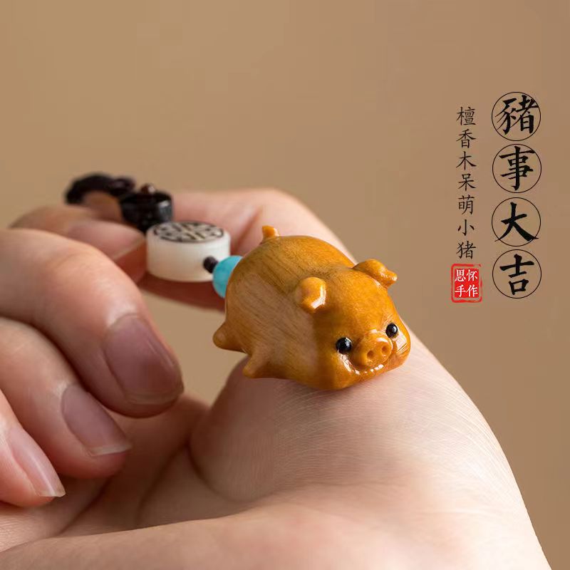 chinese green sandalwood wood carving keychain pig