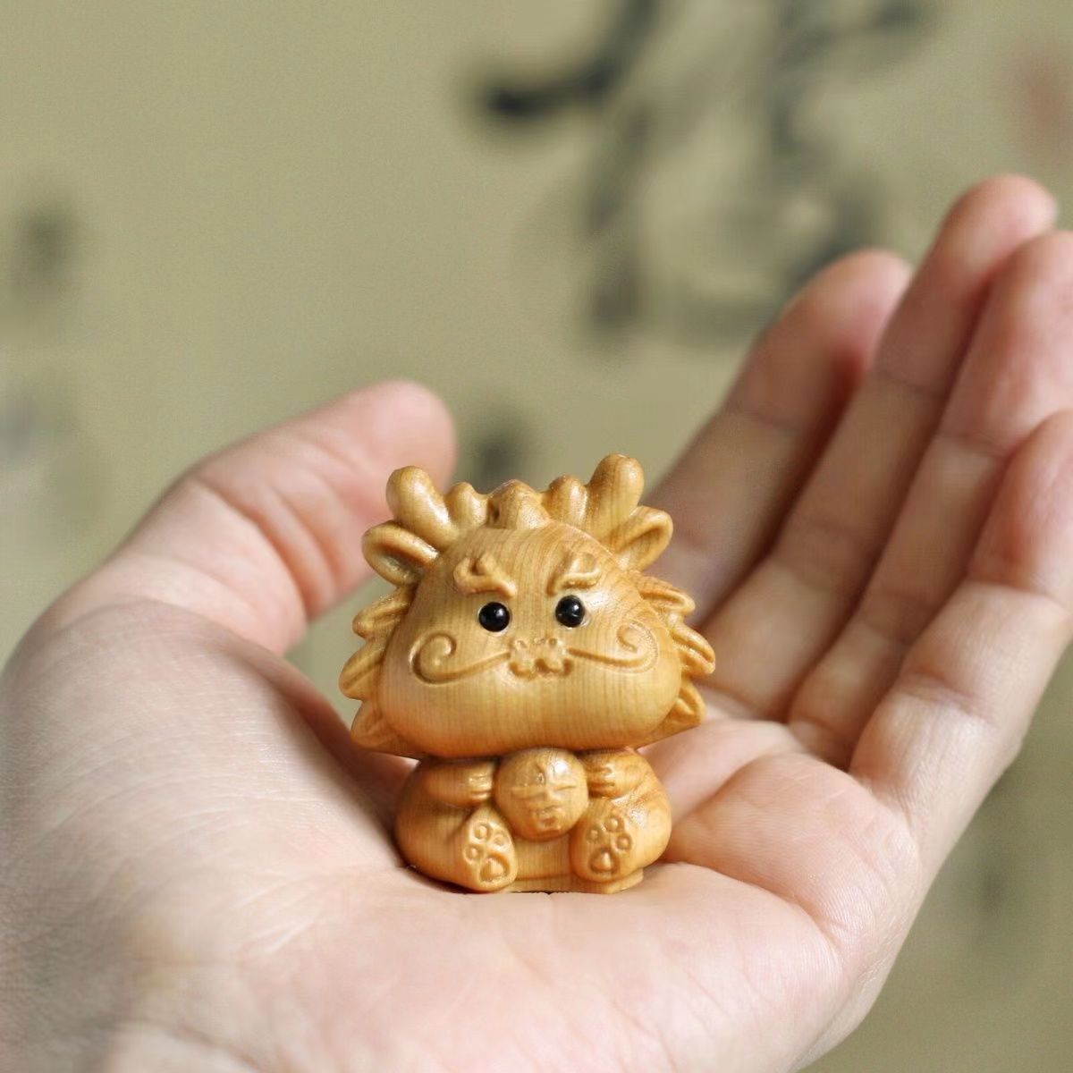 chinese arborvitae wood carving dragon baby