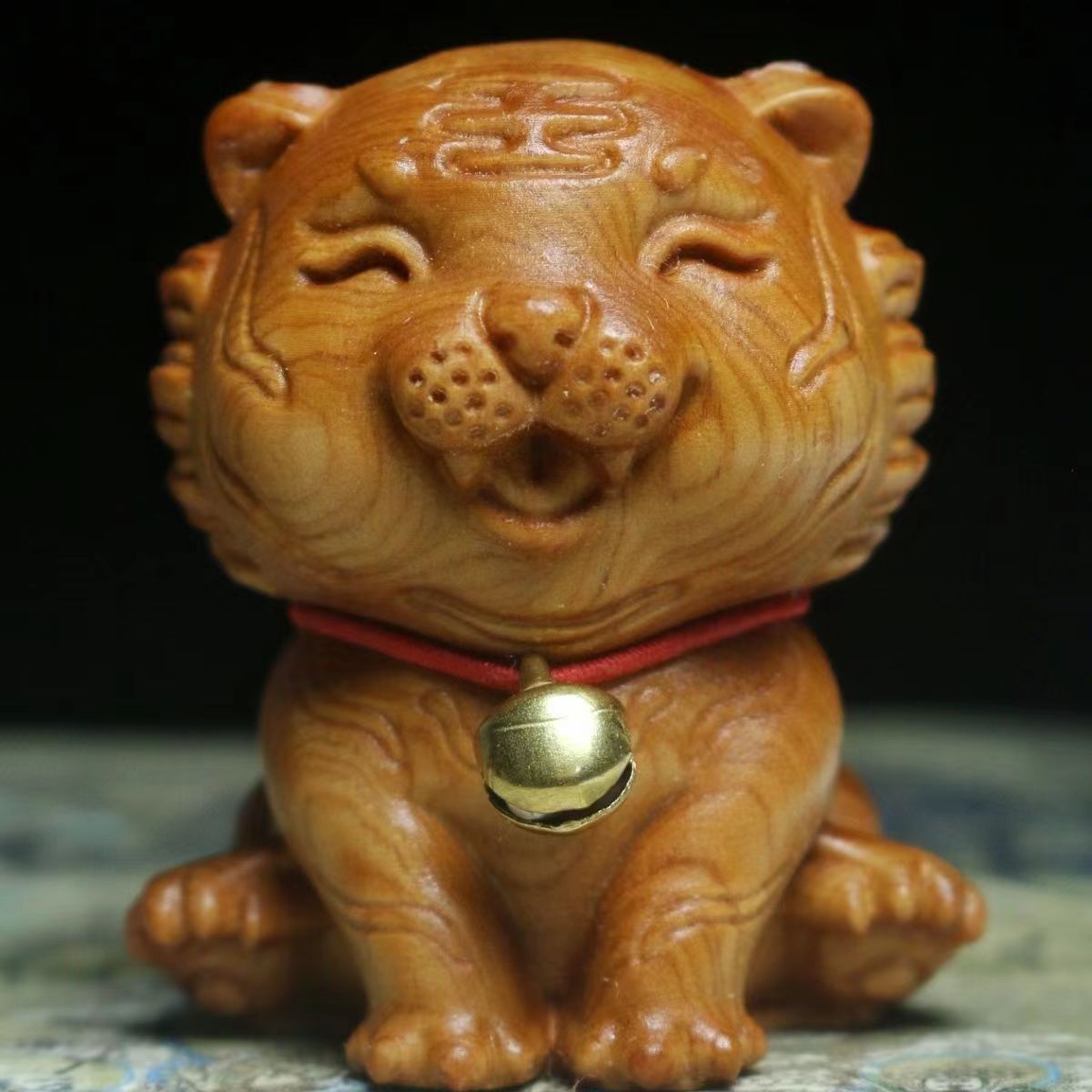 chinese arborvitae wood carving tiger baby