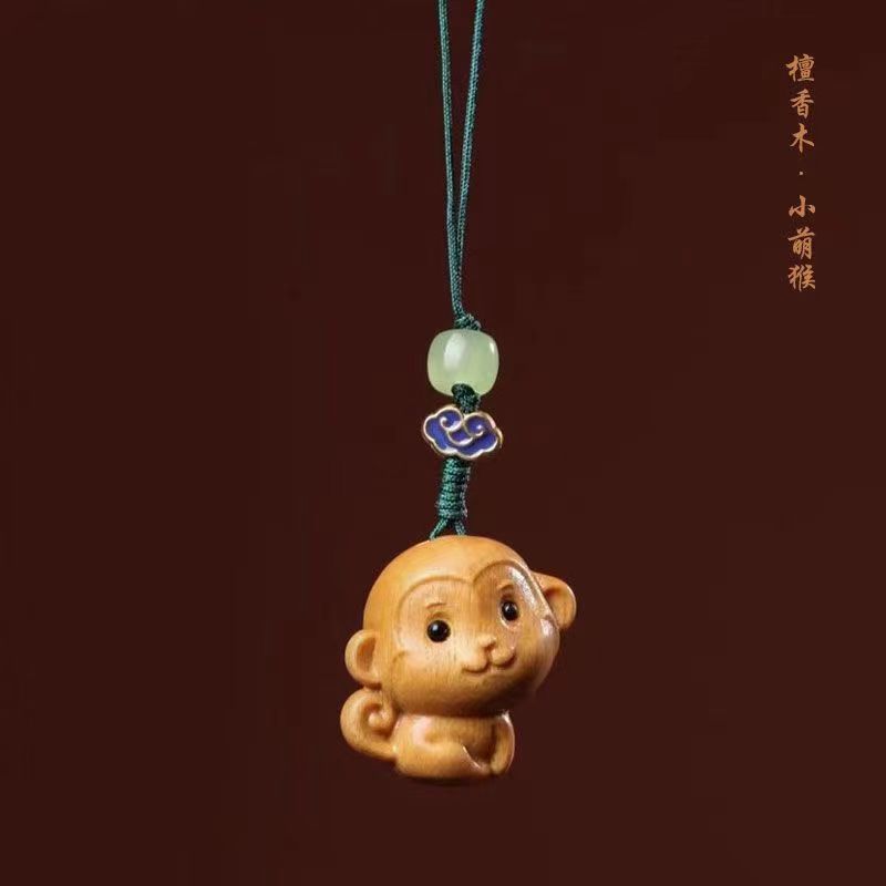 chinese green sandalwood wood carving keychain baby monkey