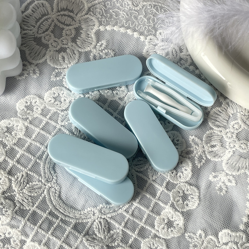 Cream-colored Contact Lens Remover Tool