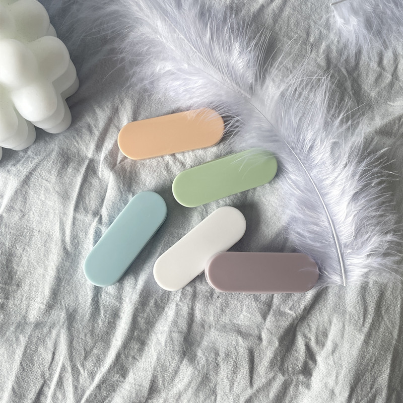 Cream-colored Contact Lens Remover Tool