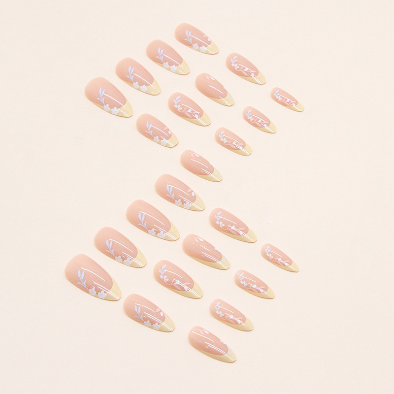 M103 French tip  yellow leaves Almond medium nails