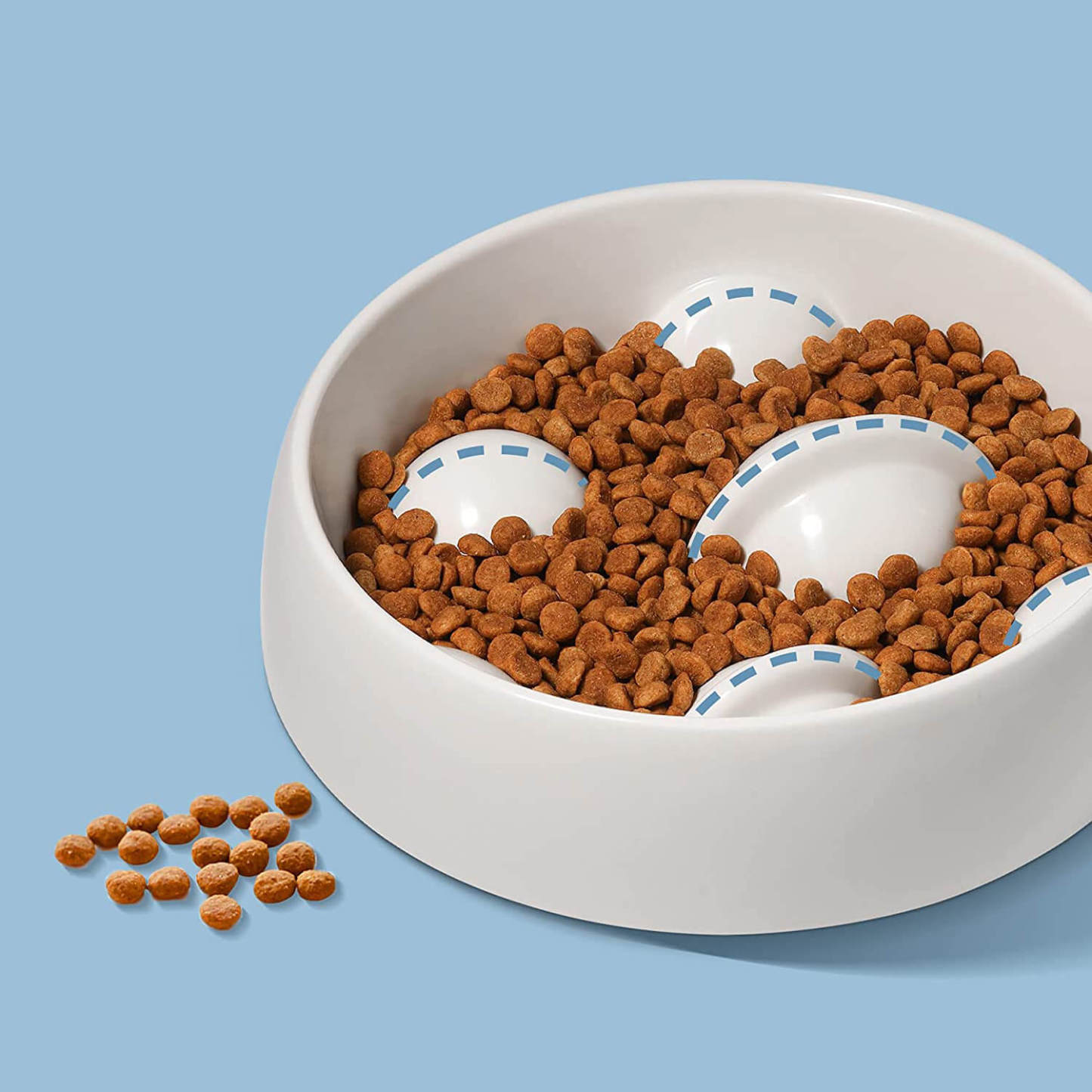 White dog bowl with many protrusions filled with dog food. Explain why it could have a longer eating time.