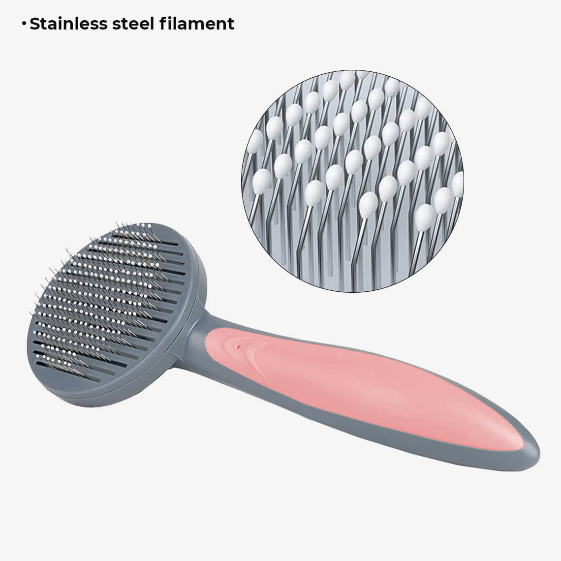 A pink pet comb and its close up of the stainless steel filament.