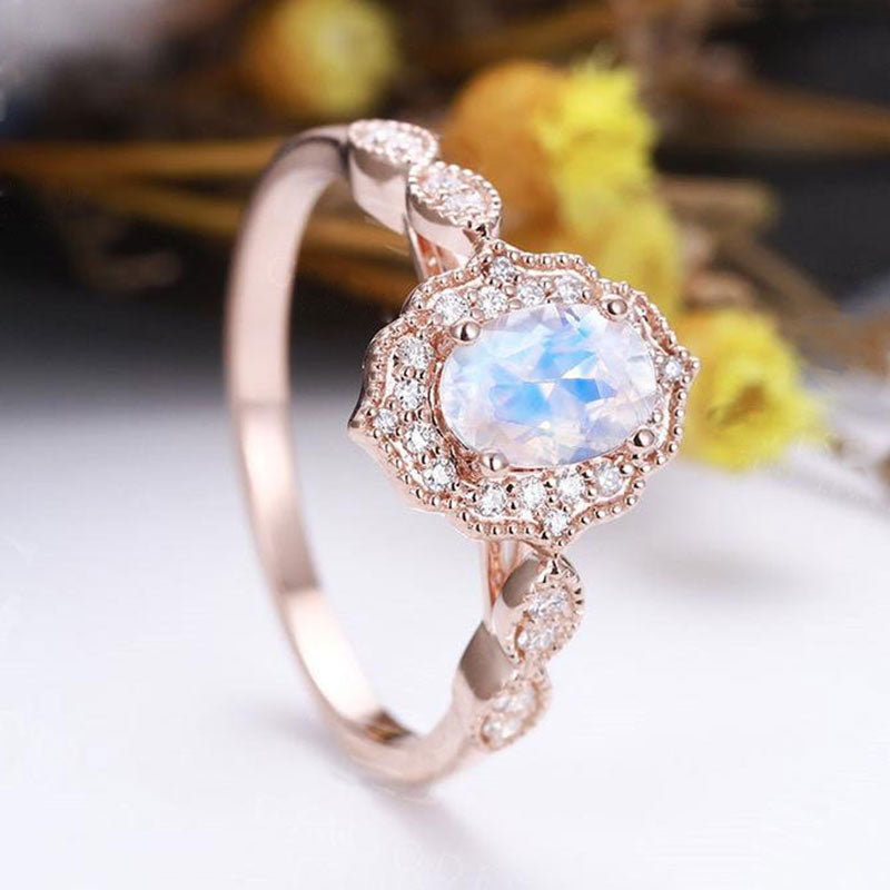 Rose gold moonstone engagement on sale ring