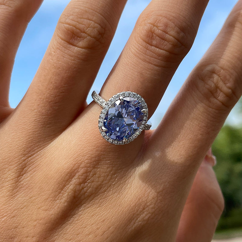 Blue oval engagement on sale rings