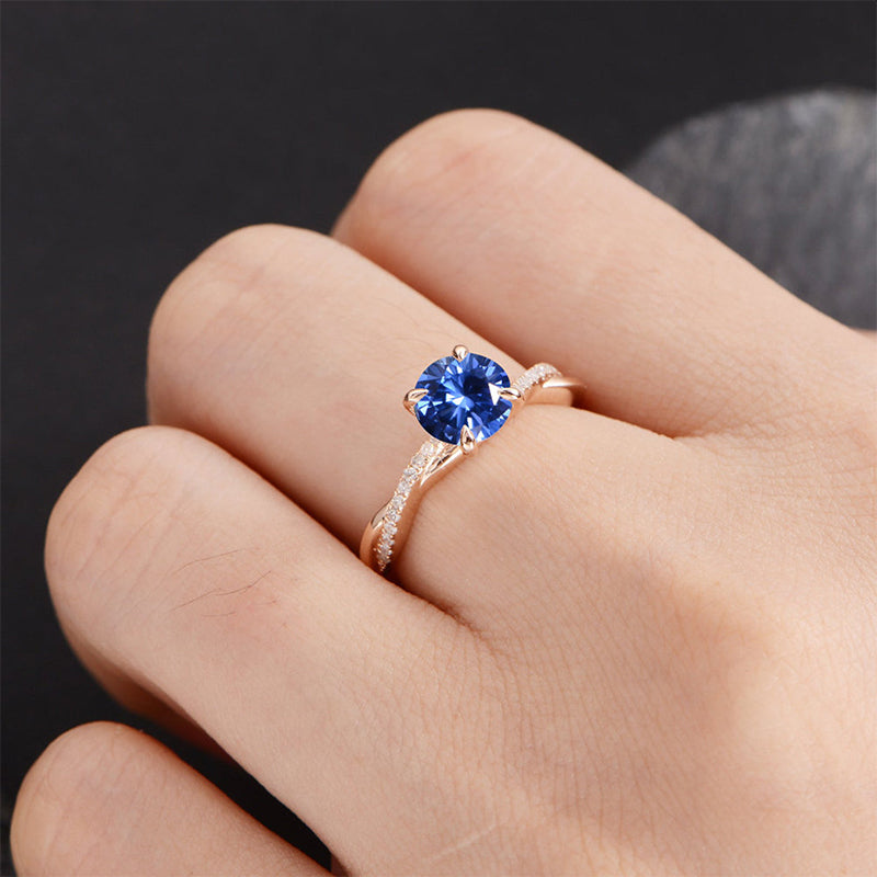 Sapphire twist store engagement rings