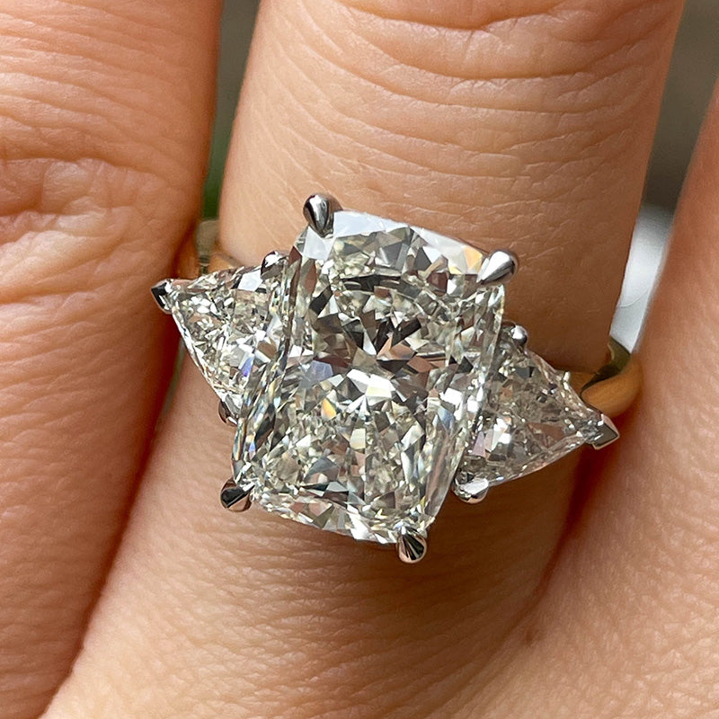 Radiant cut three on sale stone engagement ring