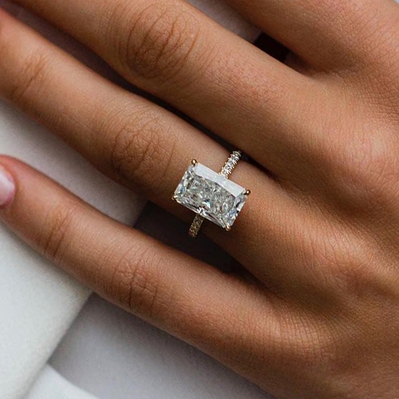 Elongated radiant cut on sale diamond ring