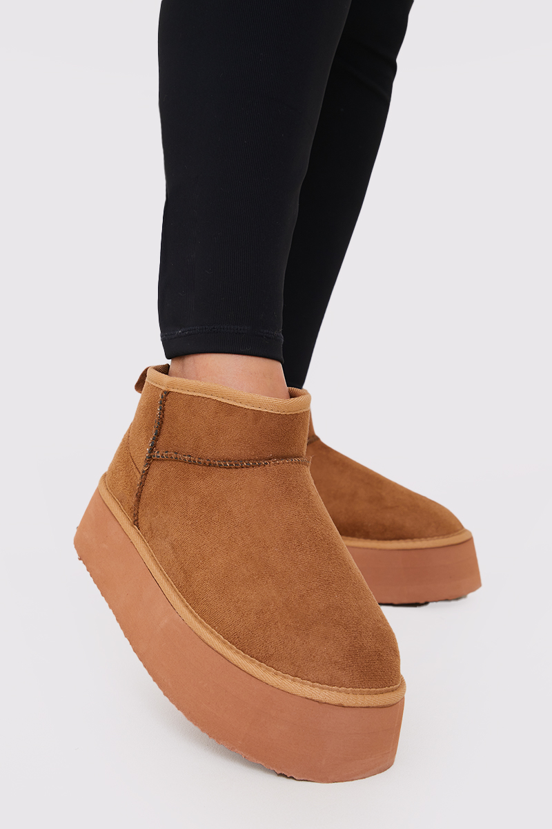 Fur lined best sale suede boots