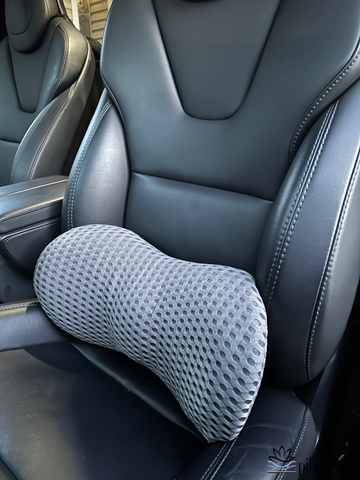 The 4D Lumbar Pillow is easily portable and great for using in the car.