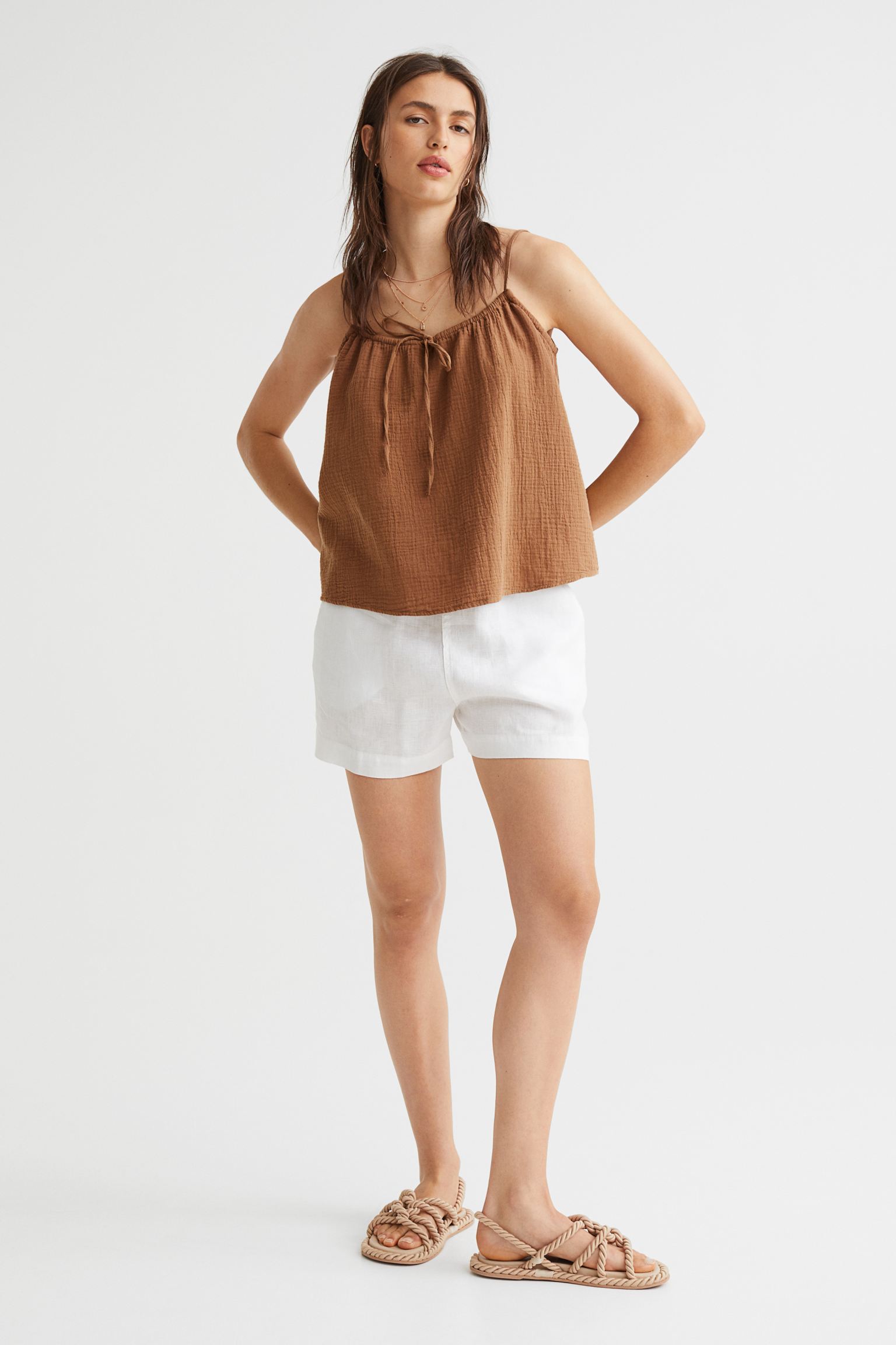 Bow-embellished spaghetti strap top