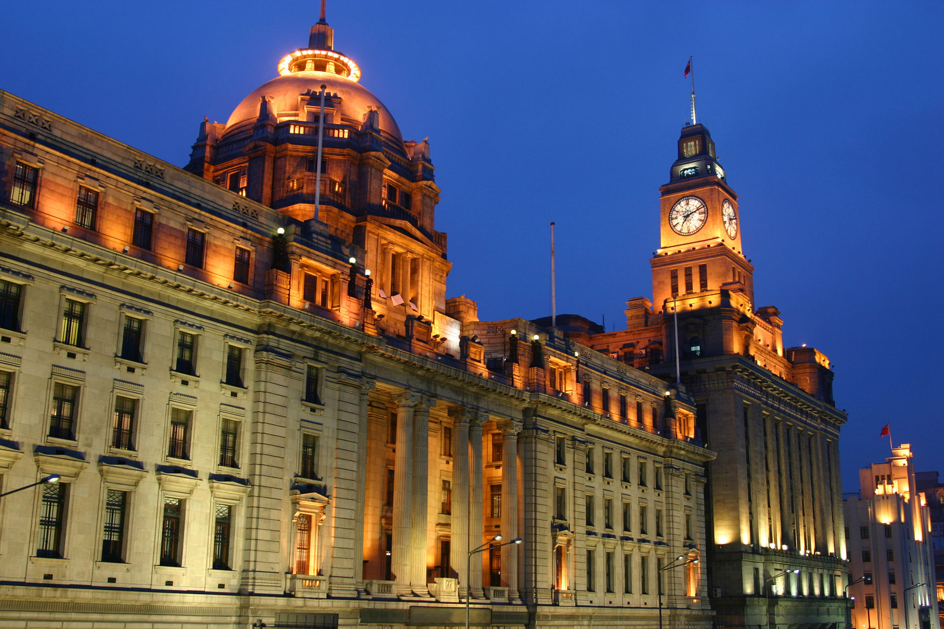The lights are on outside the Peace Hotel