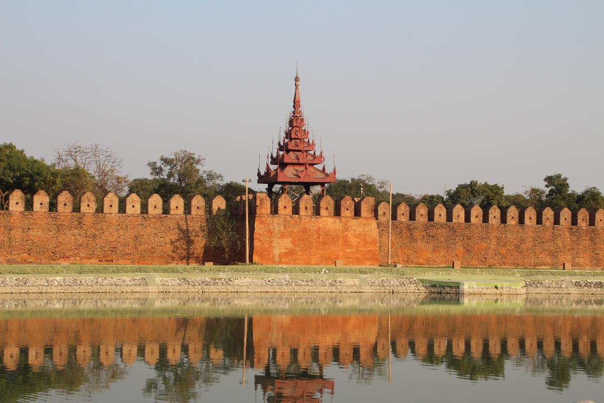 The perimeter wall of the Mandalay Palace has the very iconic spires of the Buddhist temples.