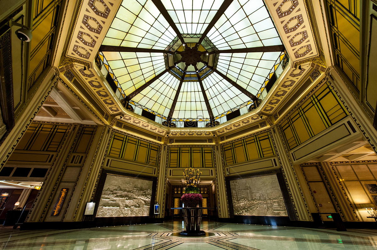 The lobby of the Peace Hotel has a lot of teak wood decoration