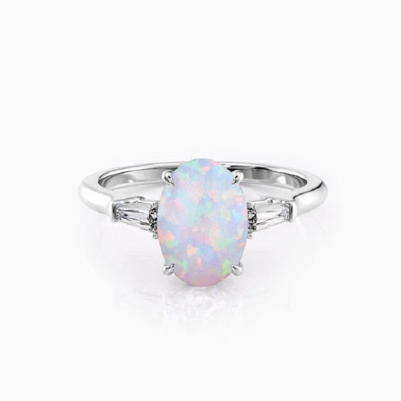 Oval Brilliant Engagement Opal Ring with Tapered Baguette Sidestones