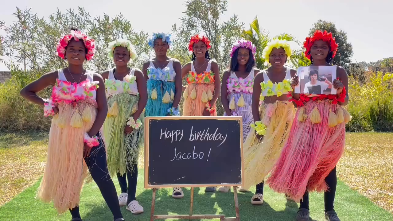 African grass skirts team