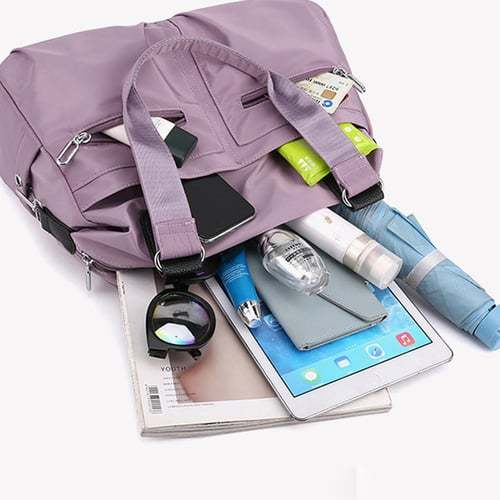 Nagy kapacitású vízálló Multi Pocket válltáska
