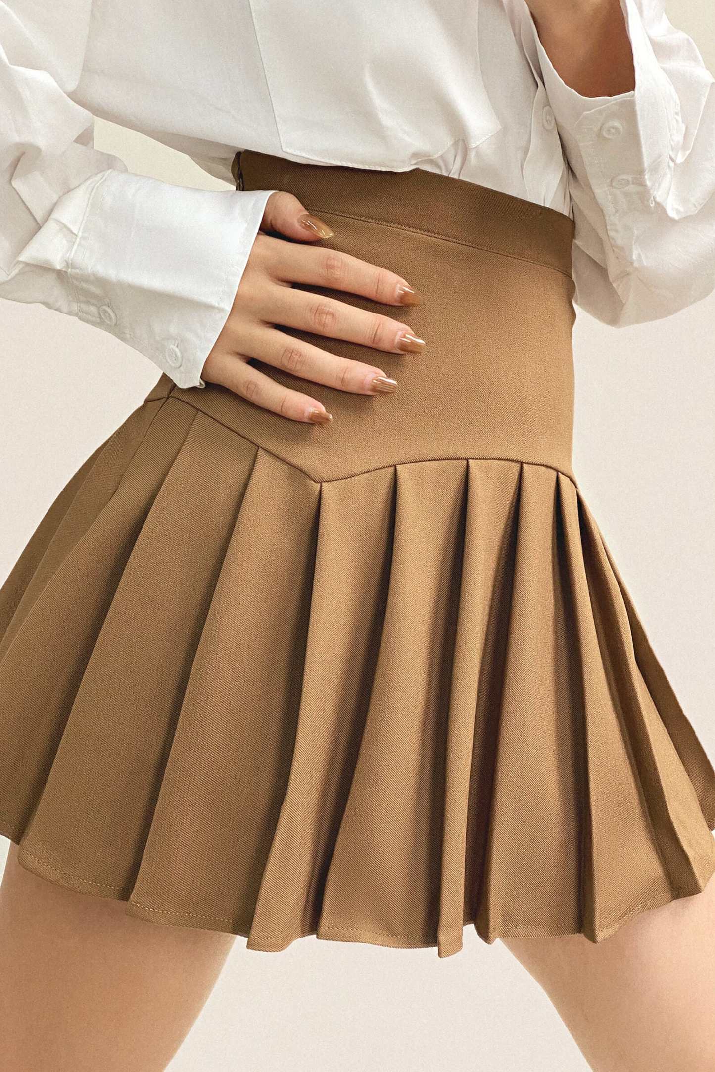 Peru Pleated High Rise Mini Skirt