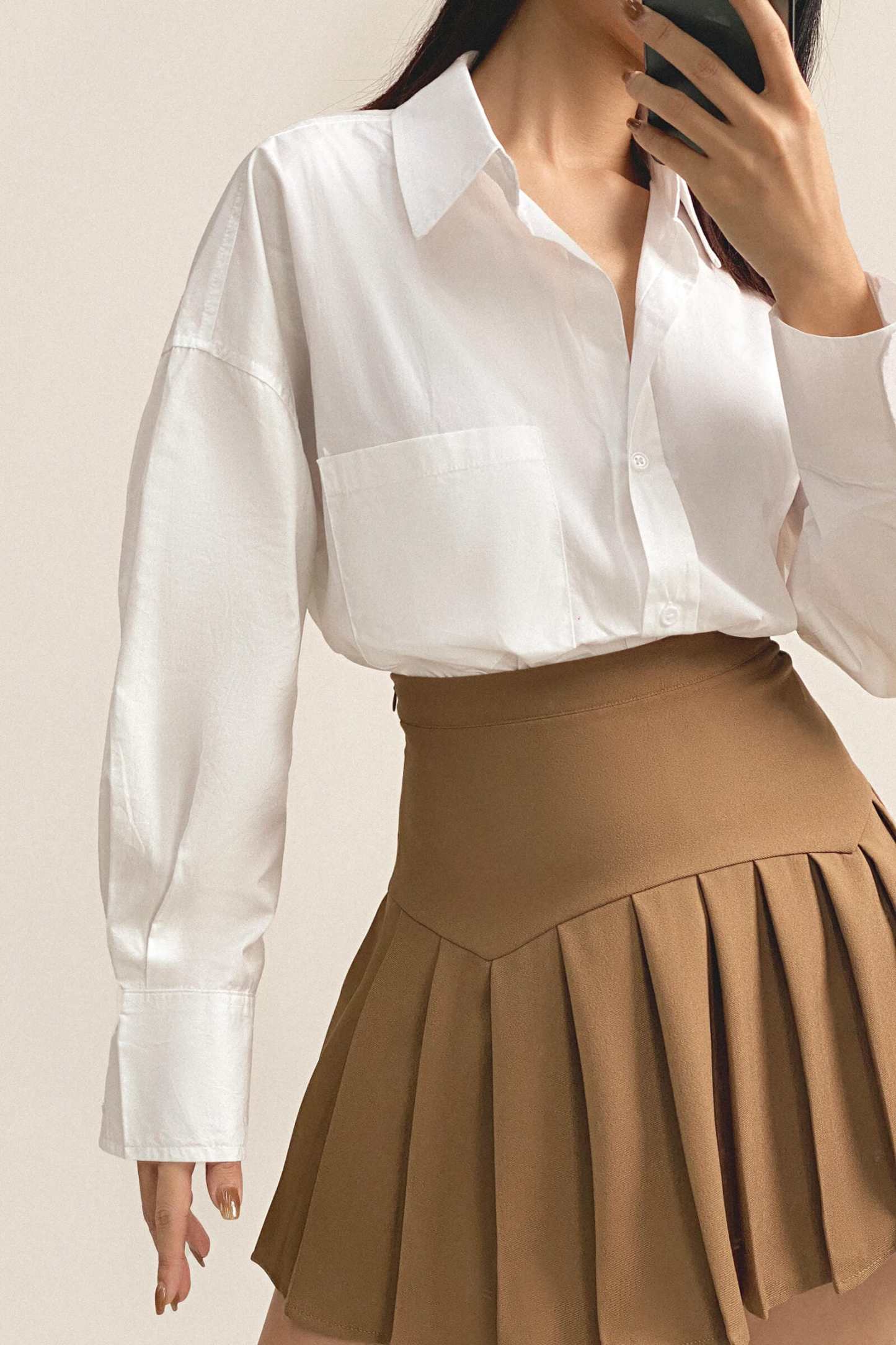 Peru Pleated High Rise Mini Skirt