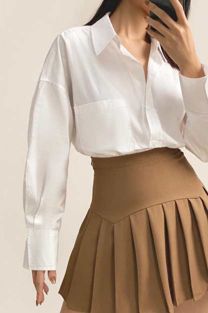 Peru Pleated High Rise Mini Skirt