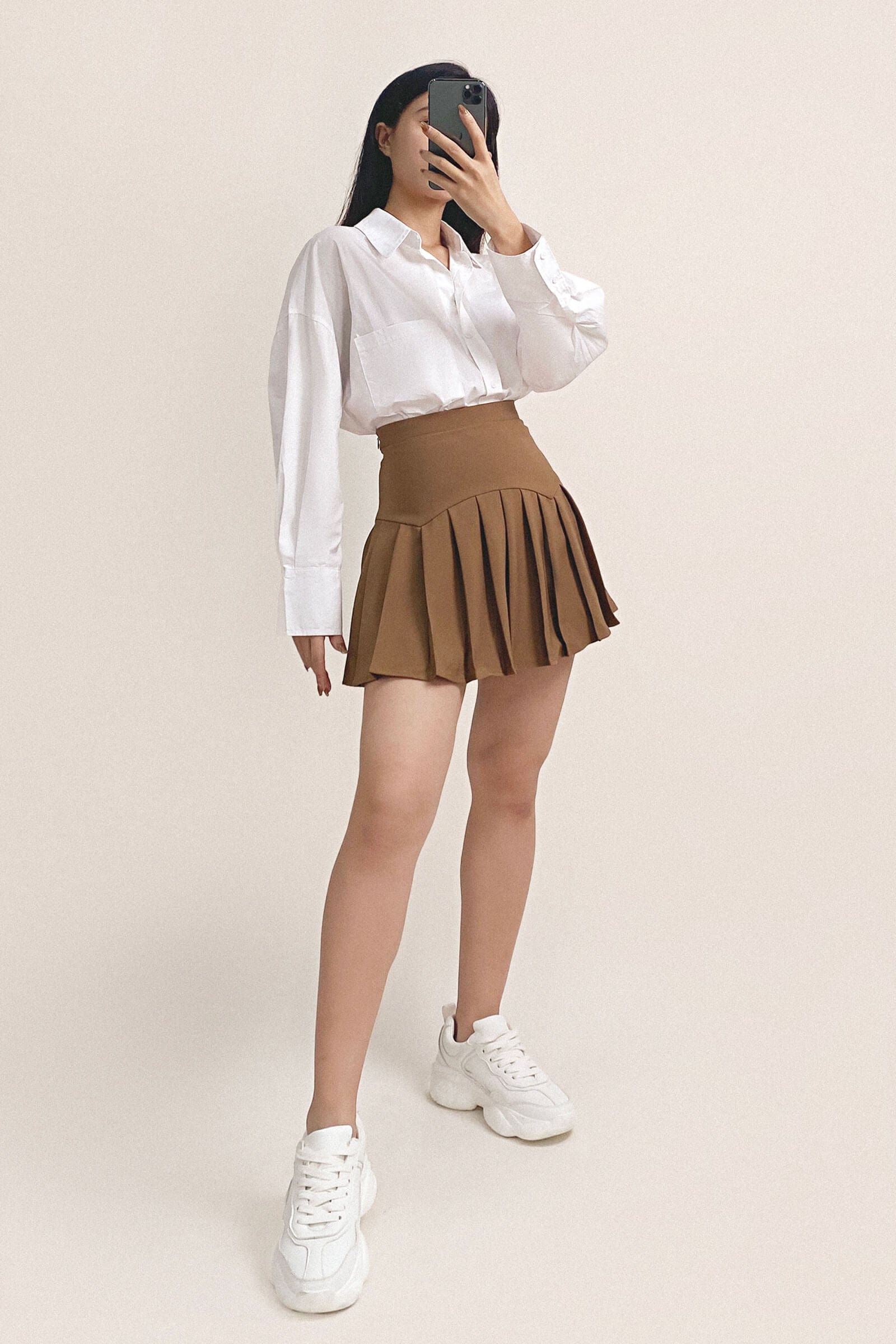 Peru Pleated High Rise Mini Skirt