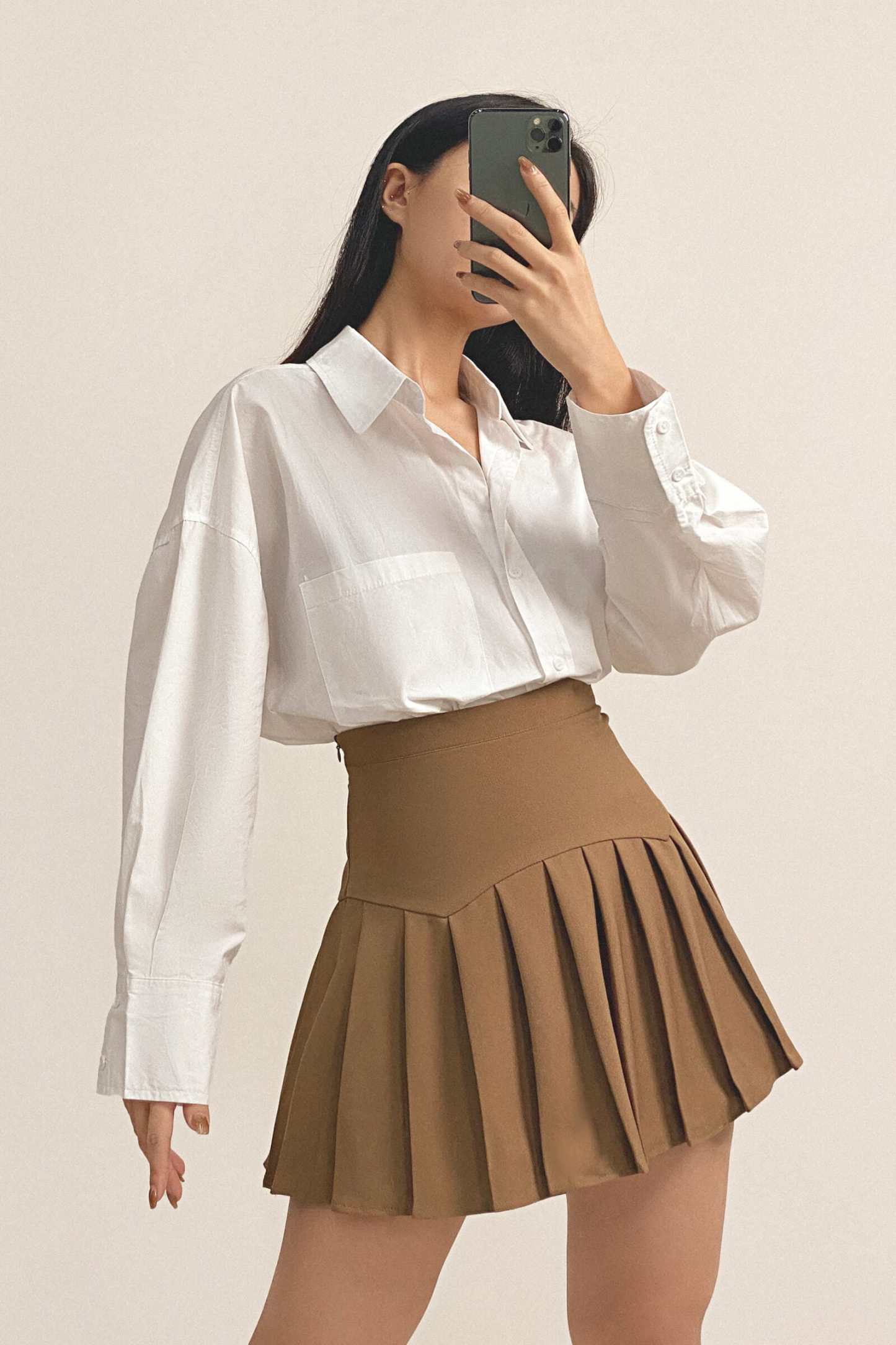 Peru Pleated High Rise Mini Skirt