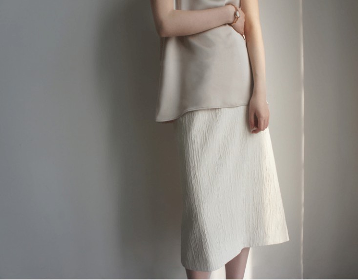 Vertical High-Rise Over-The-Knee Slit Skirt.