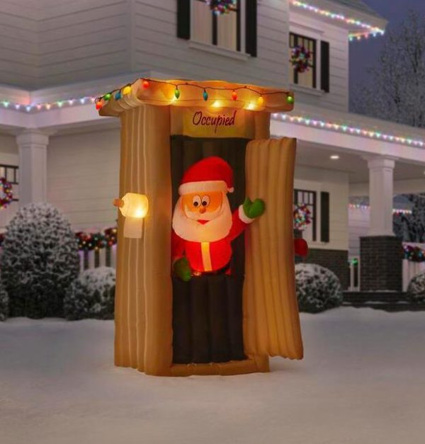 Inflatable santa deals in outhouse