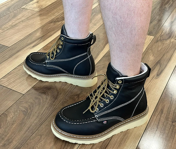 Why is it important to wear work boots?