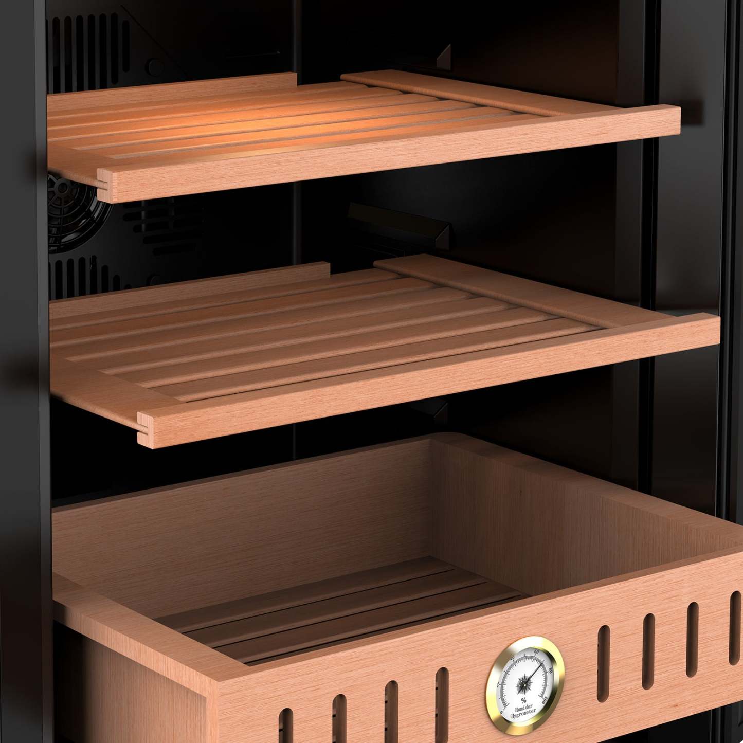 The image shows the interior of the Mojgar humidor with wooden shelves and a drawer. The Spanish cedar wood helps regulate humidity and maintain the cigars' optimal condition. A hygrometer is visible, ensuring precise humidity control for ideal cigar storage.