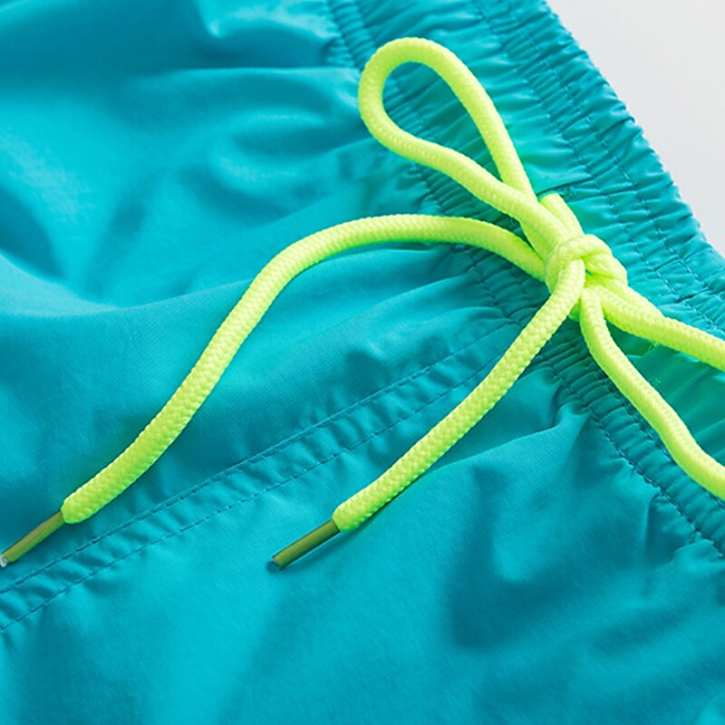 Men's Sport Runing Swimming Pockets Drawstring Breathable Solid Color Shorts 