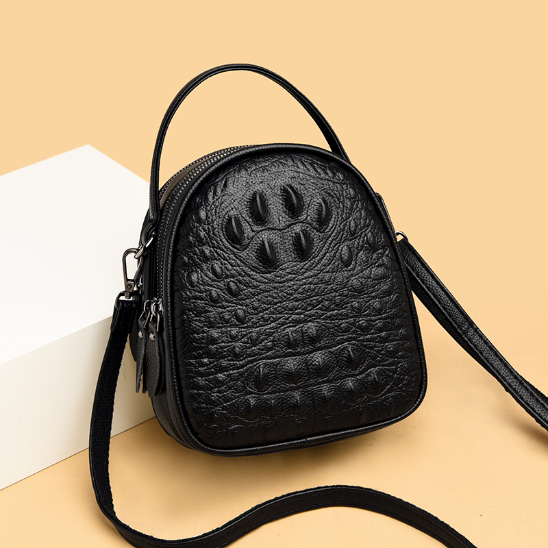 Crocodile pattern paw print handbags